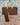 Chocolate windowpane + sand | ivory
Stone Patent Leather Trim. Stone and white pinstripe interior. Canvas base.
Plaid-patterned bag with beige straps on a white background