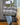 Navy tartan + green | grey
Olive Patent Leather Trim. Navy and white pinstripe interior. Canvas base.
Plaid bag with green strap on a white background