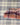 Terracotta plaid + grape | aqua
Terracotta Patent Leather Trim.  Stone and white pinstripe interior.